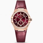 The burgundy red dial fake watch features a burgundy red strap.