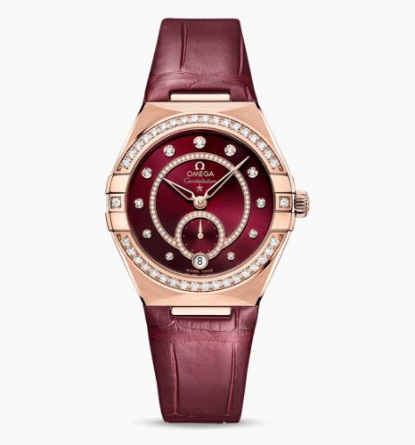 The burgundy red dial fake watch features a burgundy red strap.